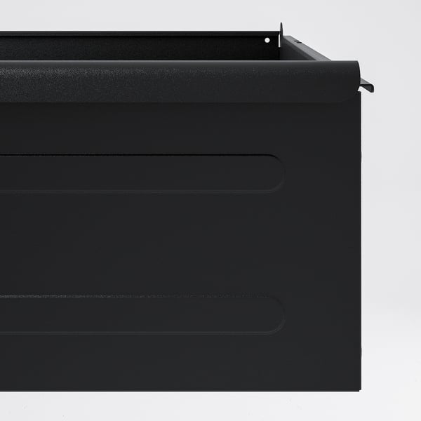 Black metal drawer with smooth finish, vertical grooves, and pull-out stop; modern, durable design.