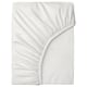 A BRUKSVARA fitted sheet in white by IKEA, made of recycled polyester, featuring a smooth texture and fitted edges.