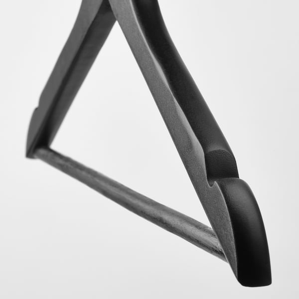 Modern hanger with sleek, curved design and sturdy construction, showcasing quality craftsmanship.