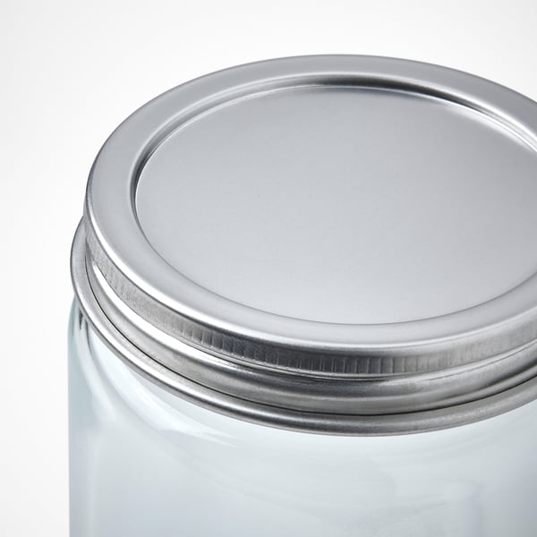 Clear glass jar with stainless steel lid; silicone seal ensures secure fit.