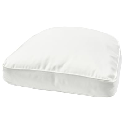 A white DJUPVIK cushion. Its rectangular, with a smooth, clean design, and made from durable cotton.