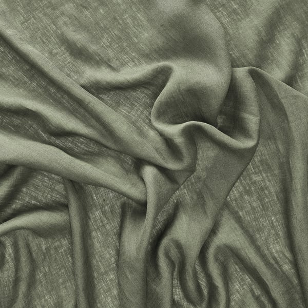 Elegant green-grey linen curtain close-up, showcasing textured weave and smooth, soft folds, ideal for a rustic or chic look.