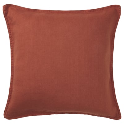 Red-brown square linen cushion with zip closure.