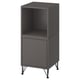 An EKET storage unit in black. It has a modern design with both open and closed compartments, supported by metal legs.