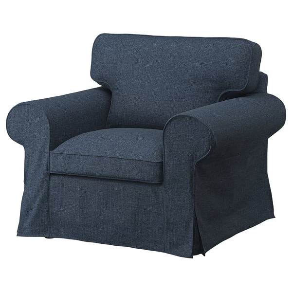 Blue EKTORP armchair, plush, dark blue fabric, rolled arms, boxy design.