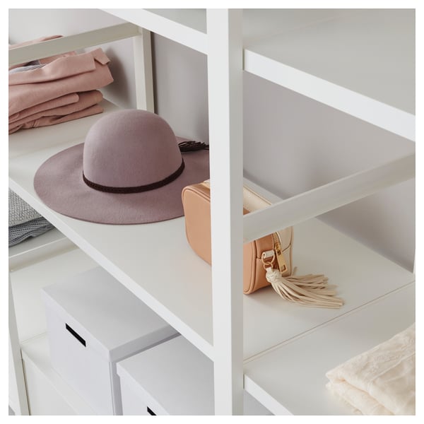 White ELVARLI storage with hat, bag, clothes, basket, and drawers.