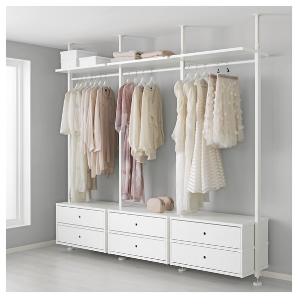 ELVARLI wardrobe: white, floor-to-ceiling aluminium post, hangers with clothes, drawers & shelf.