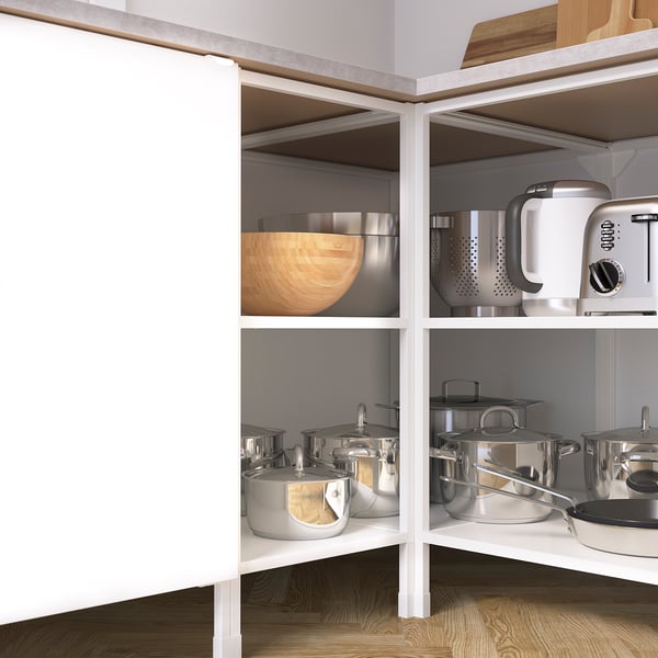 Open kitchen shelves with pots, pans, and wooden bowl; part of ENHET series.