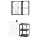 Modern bathroom setup: white cabinet, black shelving, wall-mounted mirror.