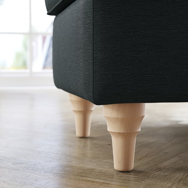 Modern black fabric sofa with sleek wooden legs. Elegant and comfortable with a timeless design.