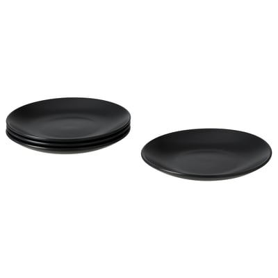 This image shows black round plates. Four stacked together with one separate. Elegant, modern design, made of stoneware.