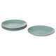 Set of four sea-green stoneware plates, plain design.