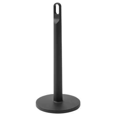 A black FAMILJ paper towel holder. It is tall with a circular base, made of polypropylene plastic, and has a loop at the top for carrying.