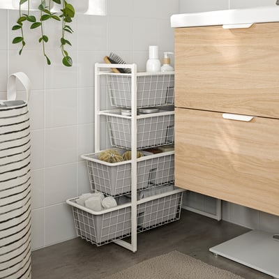 Bathroom drawer with FÅNGGRÖDA insert organising toiletries.