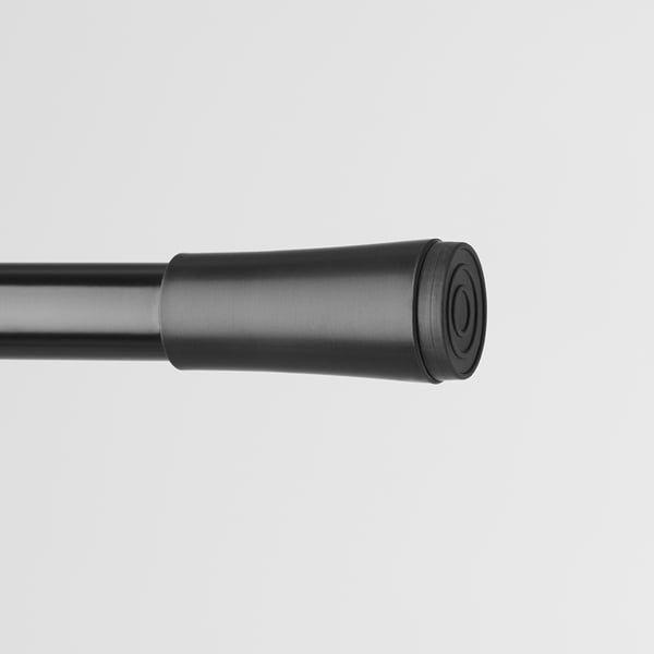 Black metal curtain rod with rubberized end cap, showing robust, durable construction. Ideal for easy, secure installation.