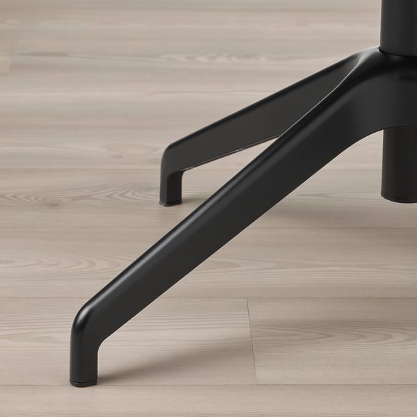 Black metal chair leg with adjustable foot, modern design.