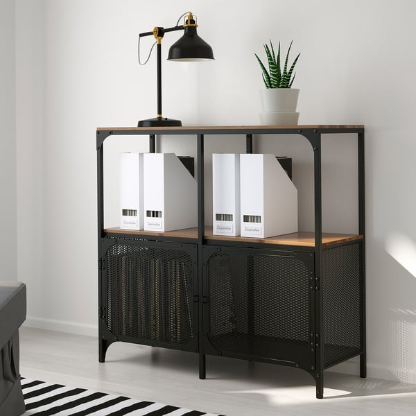 Industrial storage shelf with two open sections, holding file folders and a lamp for workspace organisation.