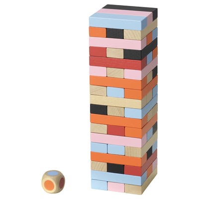 Colourful stacking blocks with dice. Multi-colored blocks form tower. Beech wood blocks and dice.
