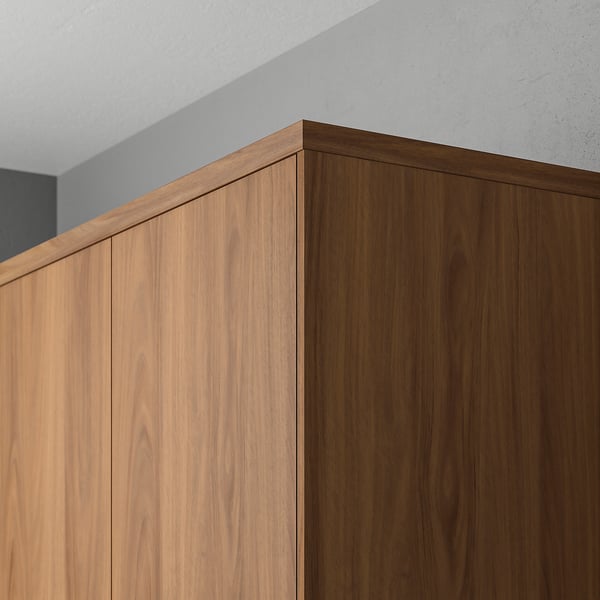 Walnut kitchen cabinet with smooth finish and cable hide.