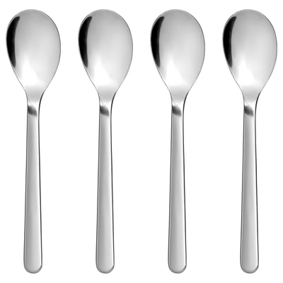 Four polished silver teaspoons aligned side by side, elegant and simple design, made of stainless steel.