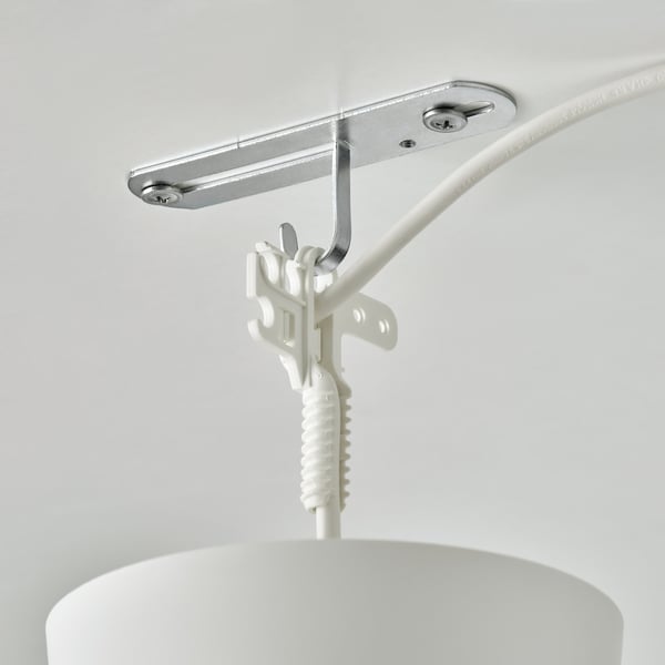 Silver ceiling hook with white cable, attaching lamp to ceiling.
