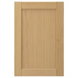 Image shows a single light oak FORSBACKA cabinet door with a classic bevelled frame design.