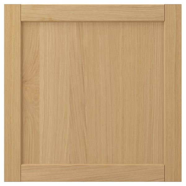 Forsbaka wood cabinet door, light brown, square shape with bevelled edges.