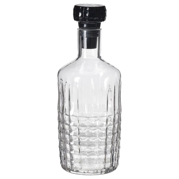 Frójda glass carafe with black stopper, clear, faceted, cylindrical shape.