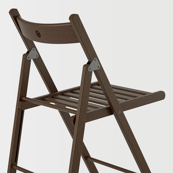 Foldable wooden chair with metal fittings, shown mid-fold, highlighting sturdy construction and compact design.