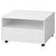 White square coffee table with wheels. Open shelf. Modern minimalist design.