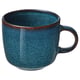 Ocean-blue stoneware mug with handle, reactive glaze finish, round shape.
