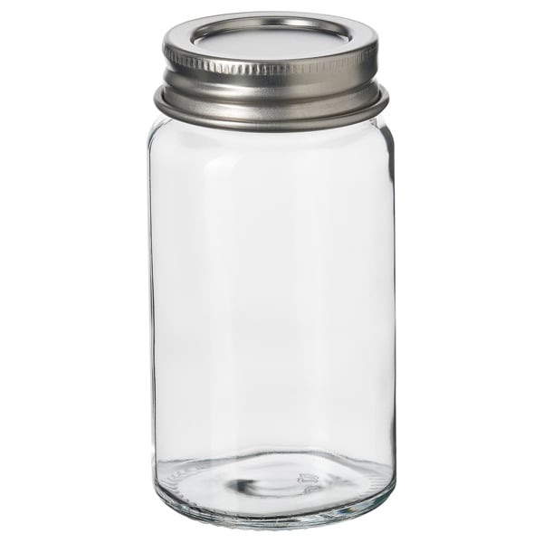 GULDFISK: small, clear glass spice jar with silver lid, round shape, simple design.
