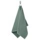 Green GULVIAL cotton towel hangs neatly on hook, soft and textured.