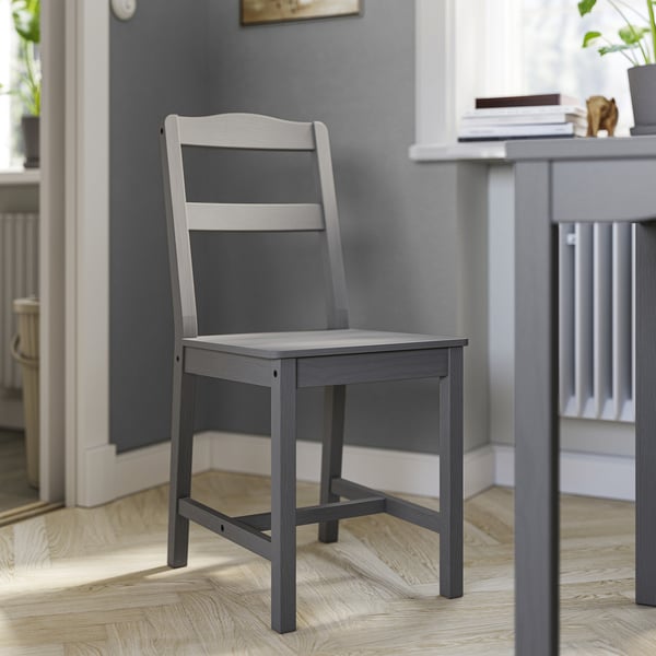IKEA HAUGA black-brown chair. Solid pine wood, 4 legs, square seat. Contemporary design.