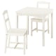 A white HAUGA 2-seat dining set with a wooden table and chairs.