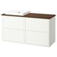 A white HAVBÄCK bathroom vanity with drawers and a wood countertop. A square ceramic sink sits atop the counter.
