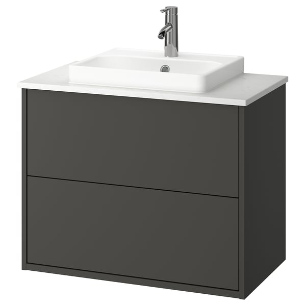 Modern grey bathroom vanity with white countertop and sink.