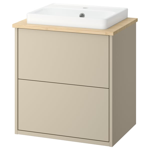 A beige HAVBÄCK bathroom vanity with a square white ceramic basin on top. It has a sleek, modern design with a wooden countertop.