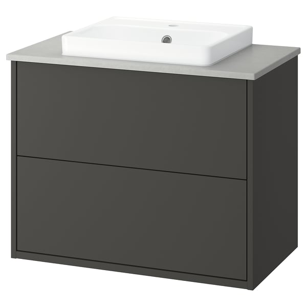 Modern dark grey bathroom vanity with single white basin.