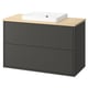 Modern dark grey HAVBÄCK bathroom cabinet with wood top and square white sink.