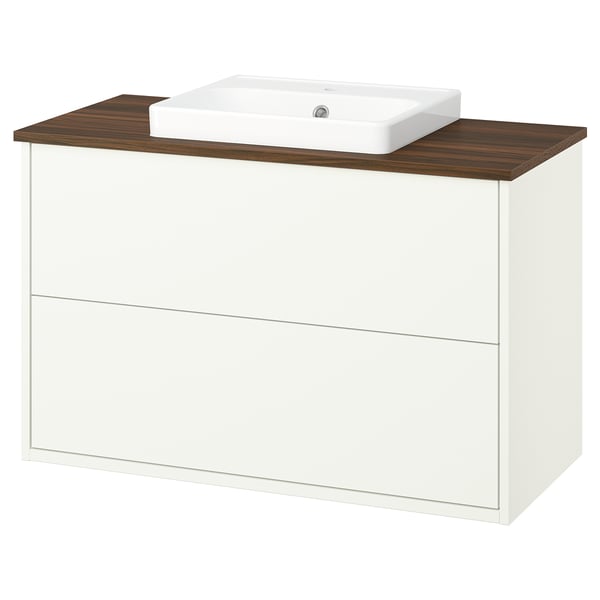 A white and wooden bathroom vanity with a square basin. Clean, modern design.