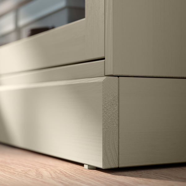 HAVSTA wooden tv stand, light beige, crafted from solid pine with a brushed surface, sliding glass doors.