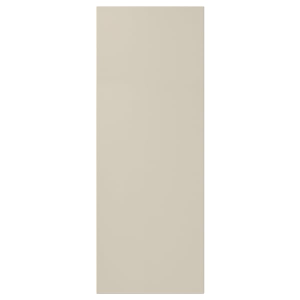 Beige HAVSTORP cabinet door, smooth fiberboard, rectangular.