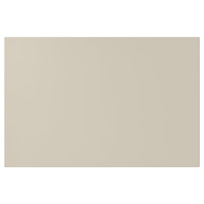 Beige HAVSTORP kitchen cabinet with smooth, rectangular design.