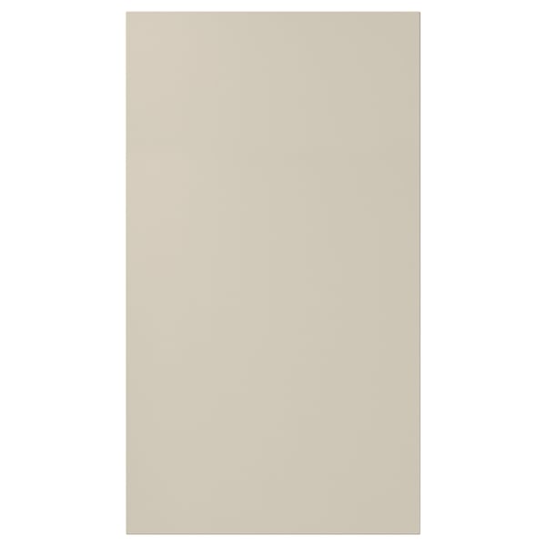 A beige HAVSTORP cabinet door, rectangular with smooth lines and a lacquered finish.
