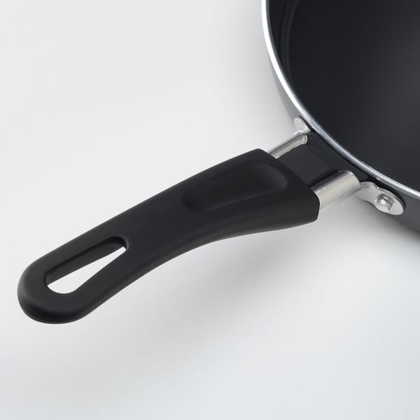 Non-stick frying pan with black handle, showcasing high-quality design and materials for even heat distribution.