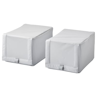 Two grey rectangular fabric covered storage boxes with ribbons and zippers.