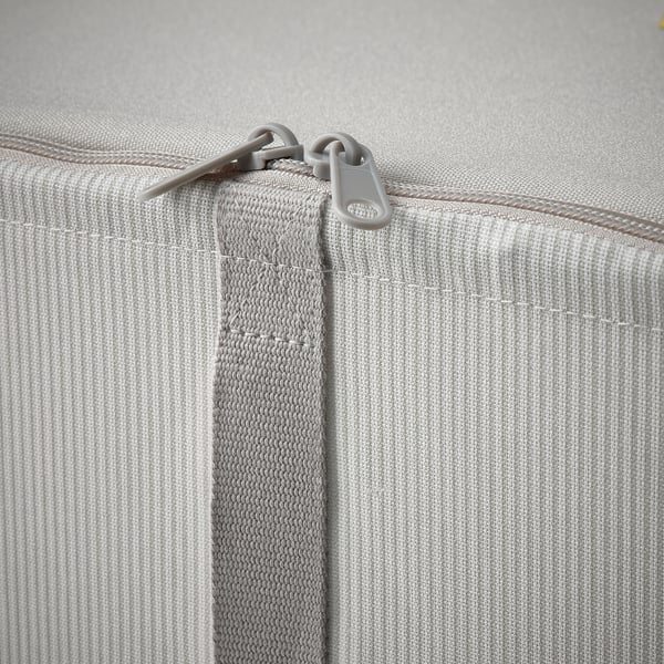 Close-up of zip on sturdy fabric storage box, showing quality and design.