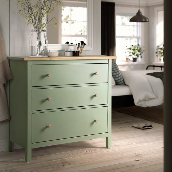Green HEMNES 3-drawer chest in bedroom with decor items.
