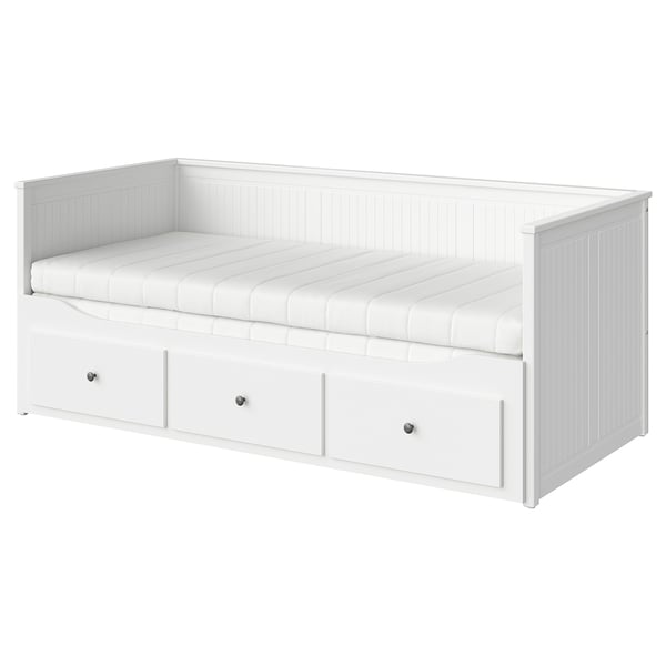 White wooden HEMNES daybed with three storage drawers, a foam mattress.